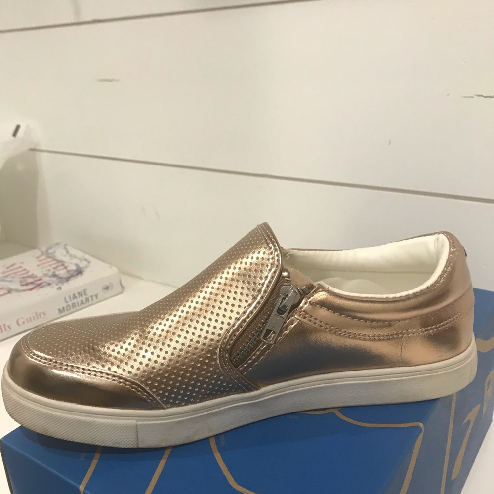 Women’s gold slip on tennis shoe